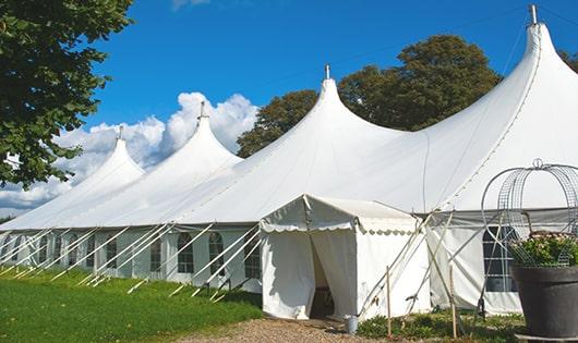 high-quality portable toilets stationed at a wedding, meeting the needs of guests throughout the outdoor reception in Wilsons